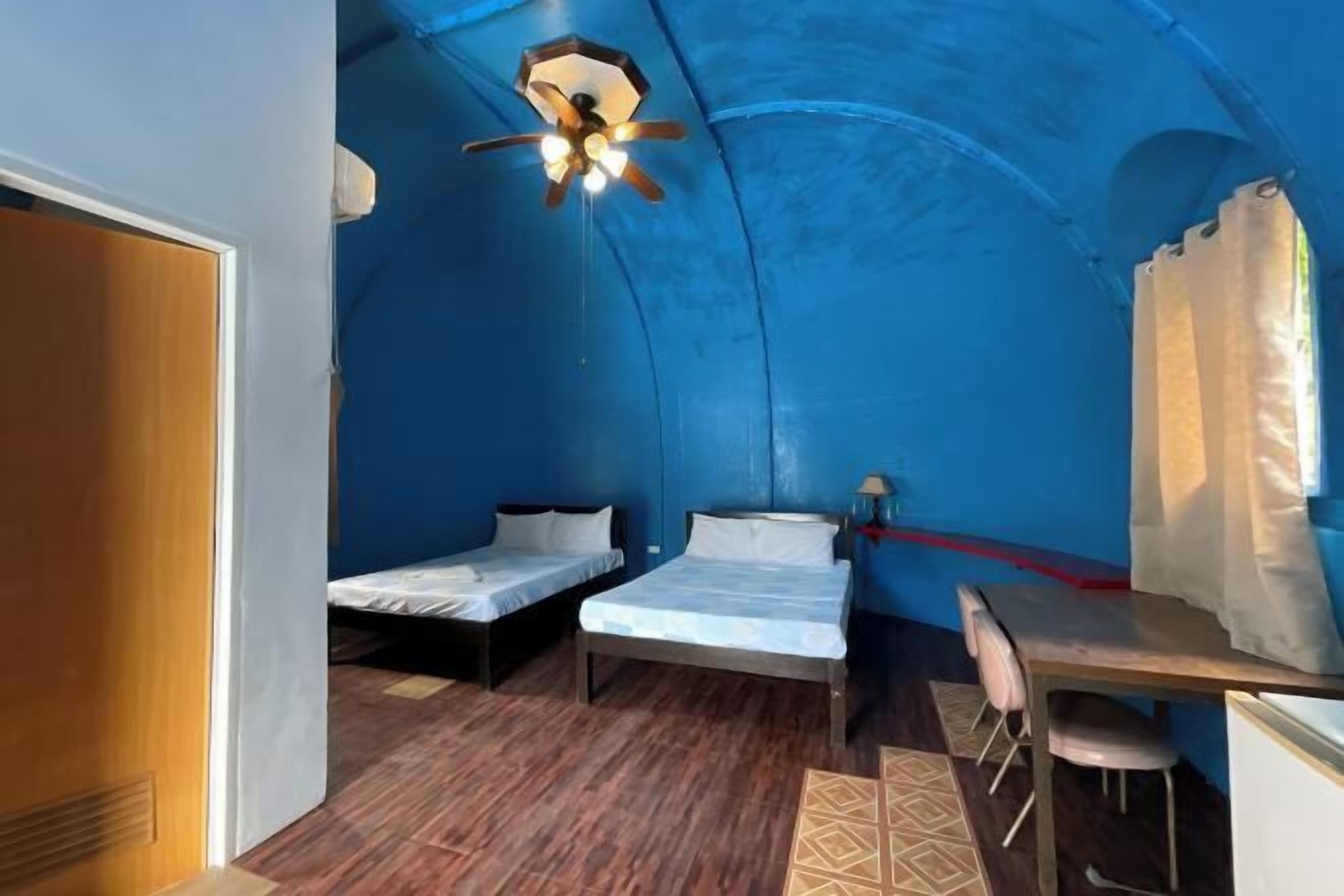 Desk, blackout curtains, bed sheets