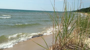 On the beach, sun loungers, beach towels