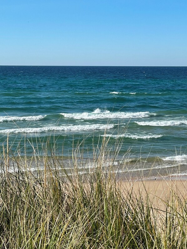 On the beach, sun-loungers, beach towels