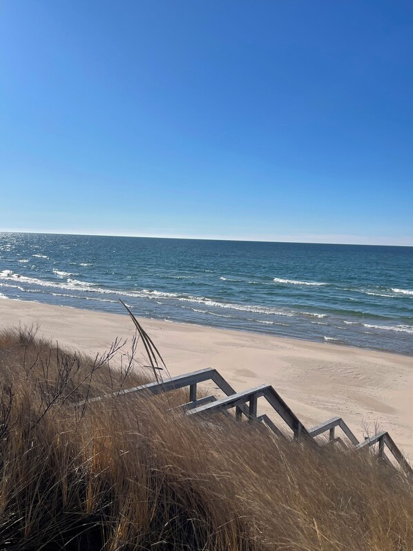 On the beach, sun-loungers, beach towels
