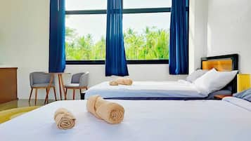 Studio Suite Keluarga, 2 Tempat Tidur Double | Selimut bulu angsa dan didekorasi berbeda-beda