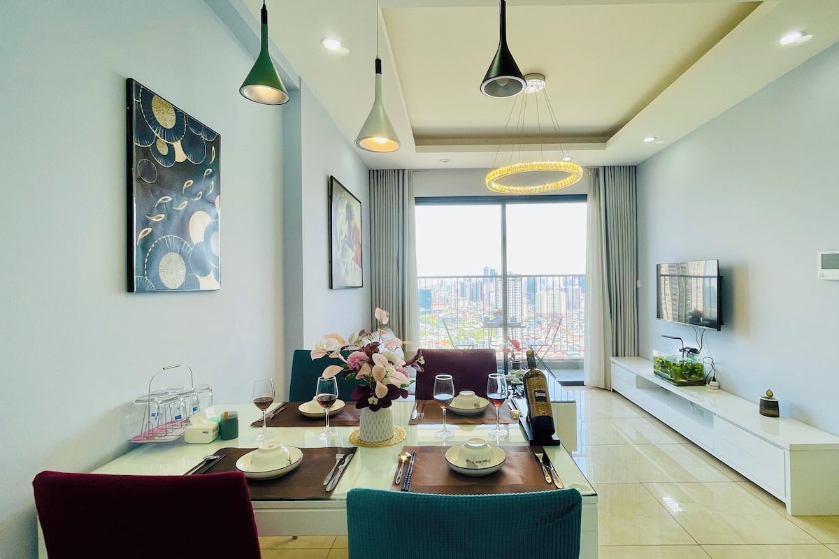 Luxury Apartment | Living area | 55-inch Smart TV with satellite channels