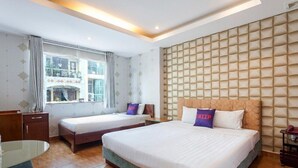 A hotel room with two beds, a desk, and a large window. - MAY'S HOTEL-BEN THANH MARKET (Ho Chi Minh City)