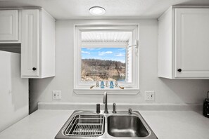 Fridge, microwave, oven, stovetop - Lighthouse Retreat – Pool, Swim Dock and More! (Lake Ozark)