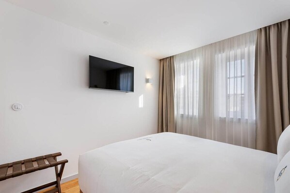 1 chambre, fer et planche à repasser, accès Internet, draps fournis