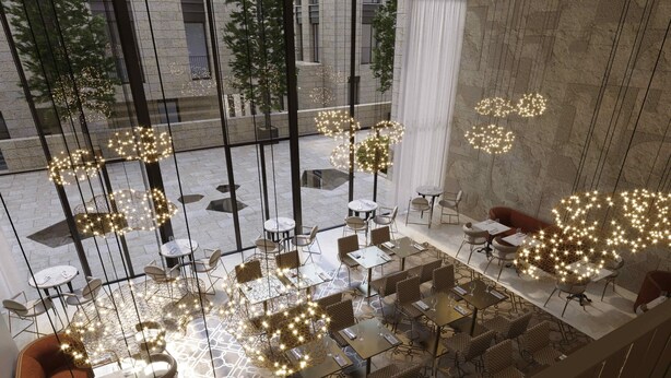 A modern indoor dining area with tables and chairs, decorative lighting, and a view of the outside. - Theatron Jerusalem Hotel & Spa - MGallery Collection (Jerusalem)