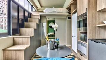 City Apartment | Living area | 50-inch flat-screen TV with cable channels, TV, Netflix