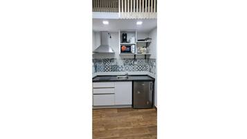 Fridge, microwave, stovetop, coffee/tea maker