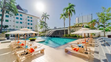 Outdoor pool, open 7:00 AM to 11:00 PM, pool umbrellas, sun loungers