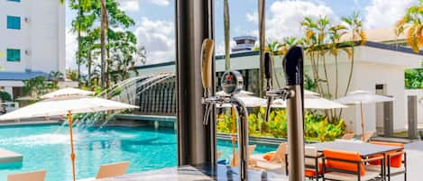 Indoor pool, open 7:00 AM to 8:00 PM, pool umbrellas, pool loungers