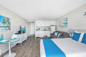 Tabla de planchar con plancha, wifi gratis y ropa de cama 