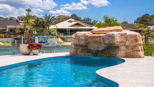 4 bedroom with large water frontage and pool