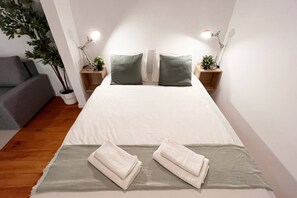 2 habitaciones, tabla de planchar con plancha y ropa de cama 