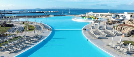 2 outdoor pools, pool umbrellas, pool loungers