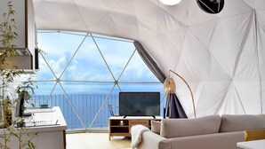 Premier Tent, 1 Queen Bed with Sofa bed | Living area | 43-inch LED TV with cable channels, TV - Vi Naturae Glamping (Calheta)