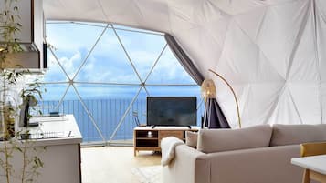 Premier Tent, 1 Queen Bed with Sofa bed | Living area | 43-inch LED TV with cable channels, TV