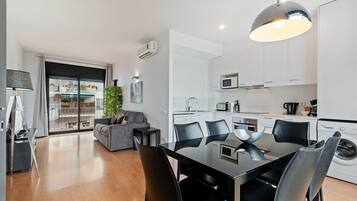 Deluxe Apartment, Terrace | Living area
