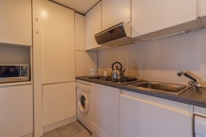 Fridge, microwave, dishwasher, coffee/tea maker