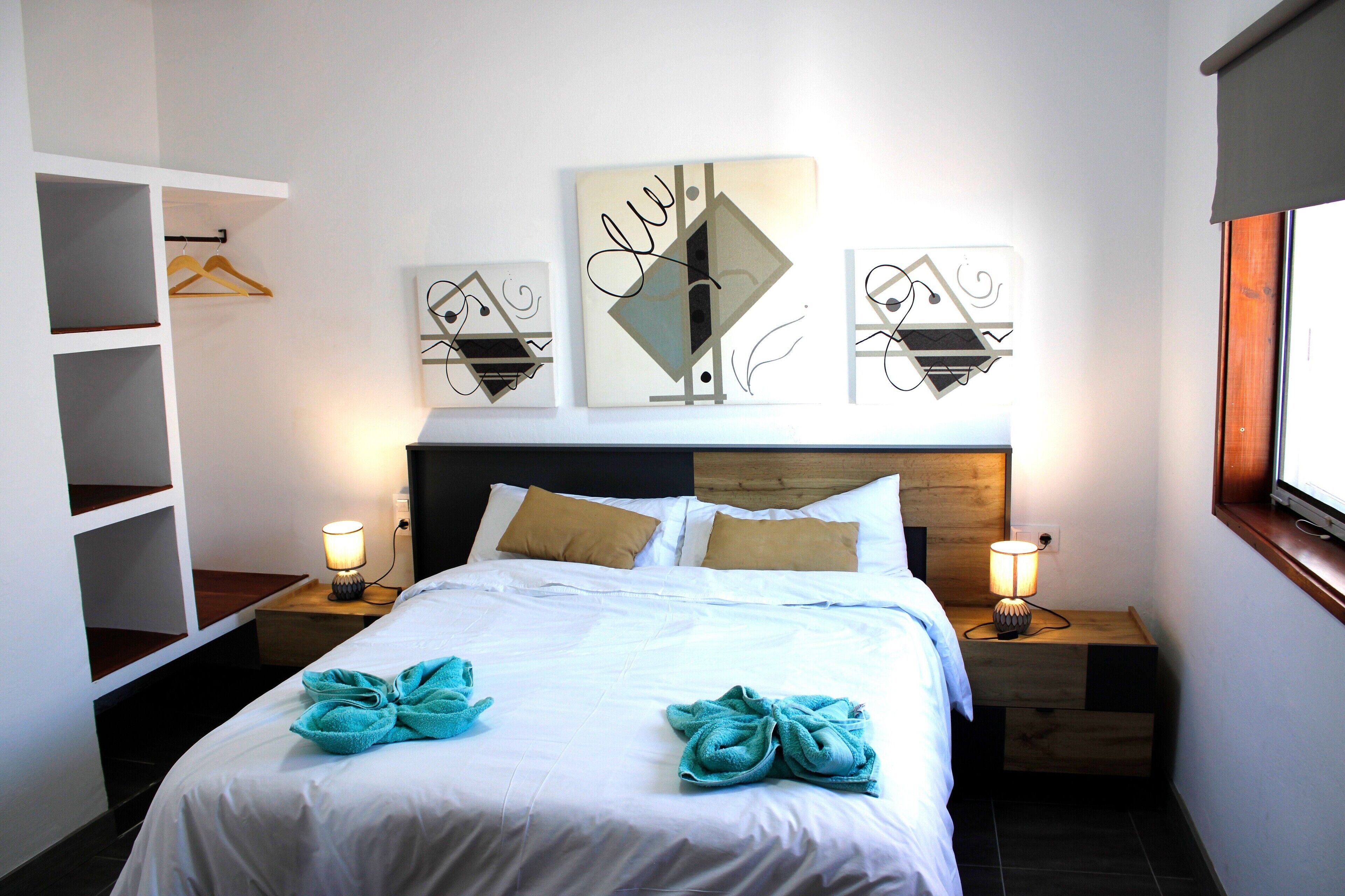 2 habitaciones, tabla de planchar con plancha y wifi gratis 
