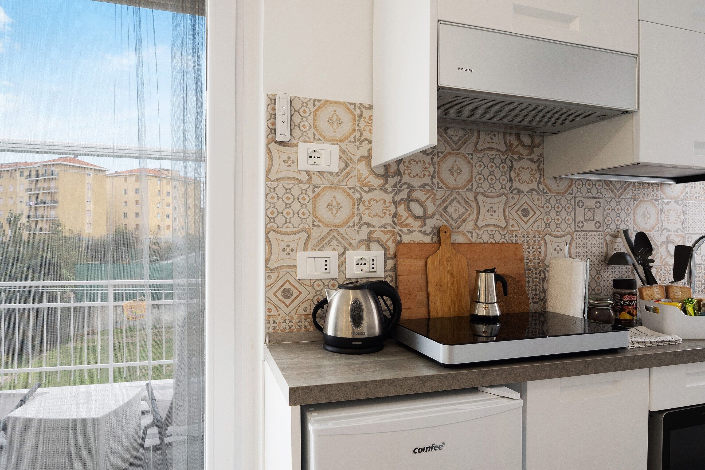 Fridge, microwave, stovetop, coffee/tea maker