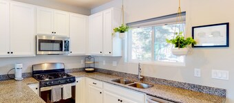 Two-story mountain view retreat with two primary suites & ideal layout