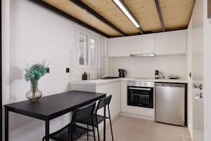 Studio Ville (A) | Cuisine privée | Mini réfrigérateur, four, cafetière/bouilloire, bouilloire électrique