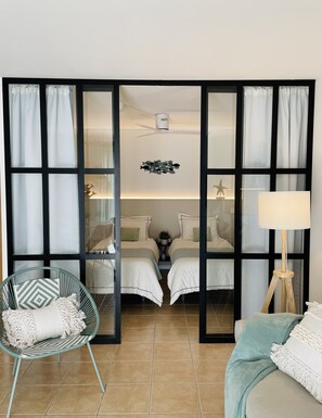 2 bedrooms, desk, iron/ironing board, travel crib