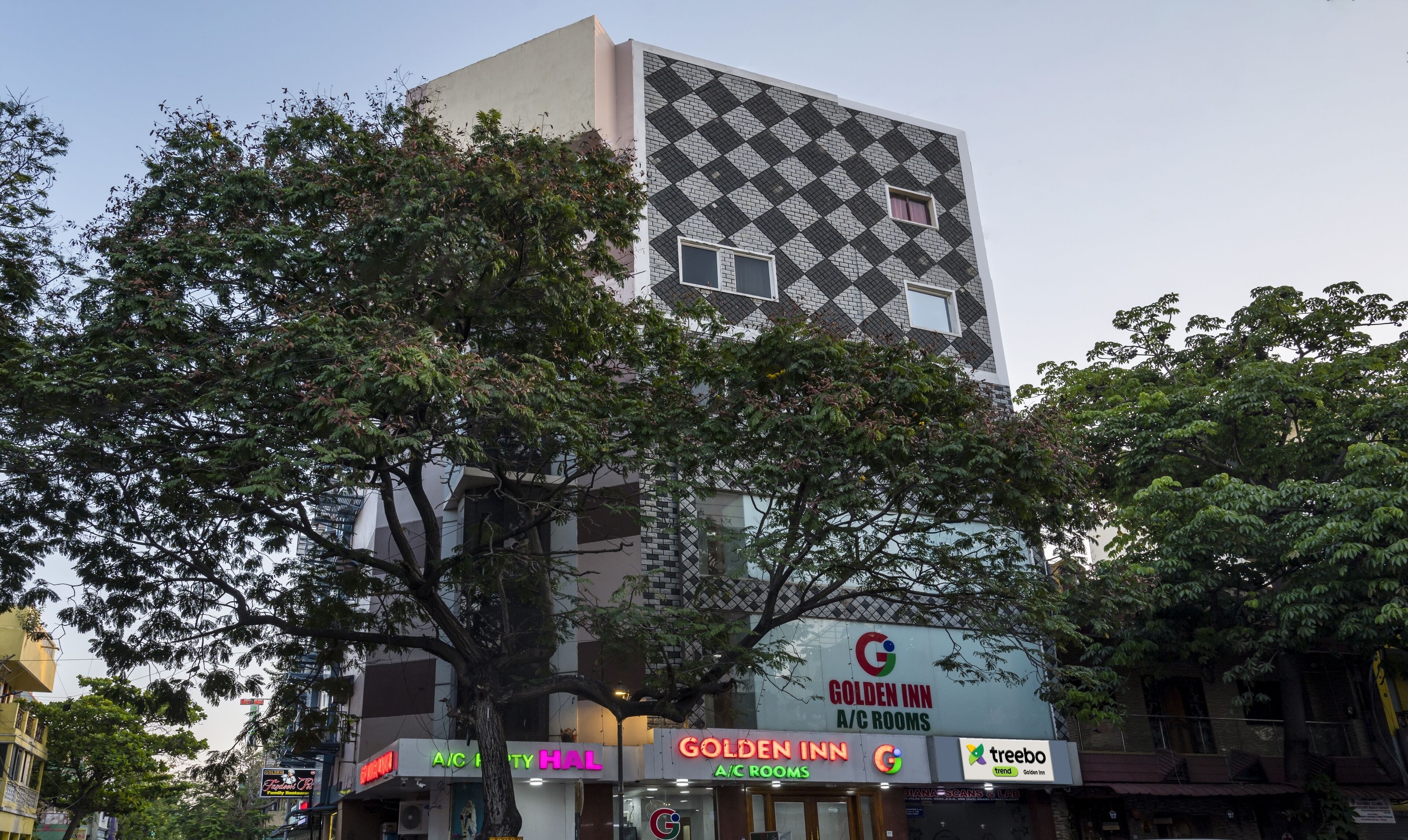 A building with a distinctive black and white diamond-patterned facade.