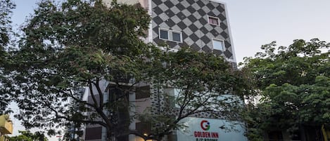 A building with a distinctive black and white diamond-patterned facade.