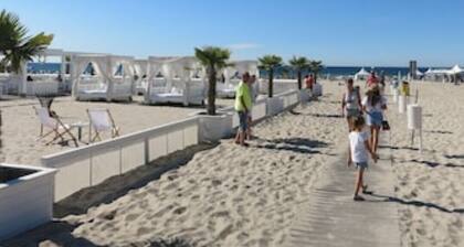 Premium apartment by the sea with garden and terrace