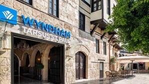 A stone building with a sign reading "WYNDHAM TARSUS ST. PAUL". - Wyndham Tarsus St.Paul (Tarsus)