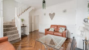Basic House, Multiple Beds | Living area | TV, fireplace