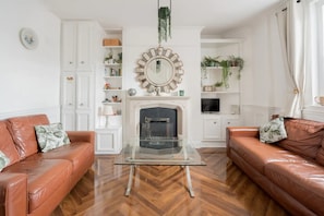 Basic House, Multiple Beds | Living area | TV, fireplace