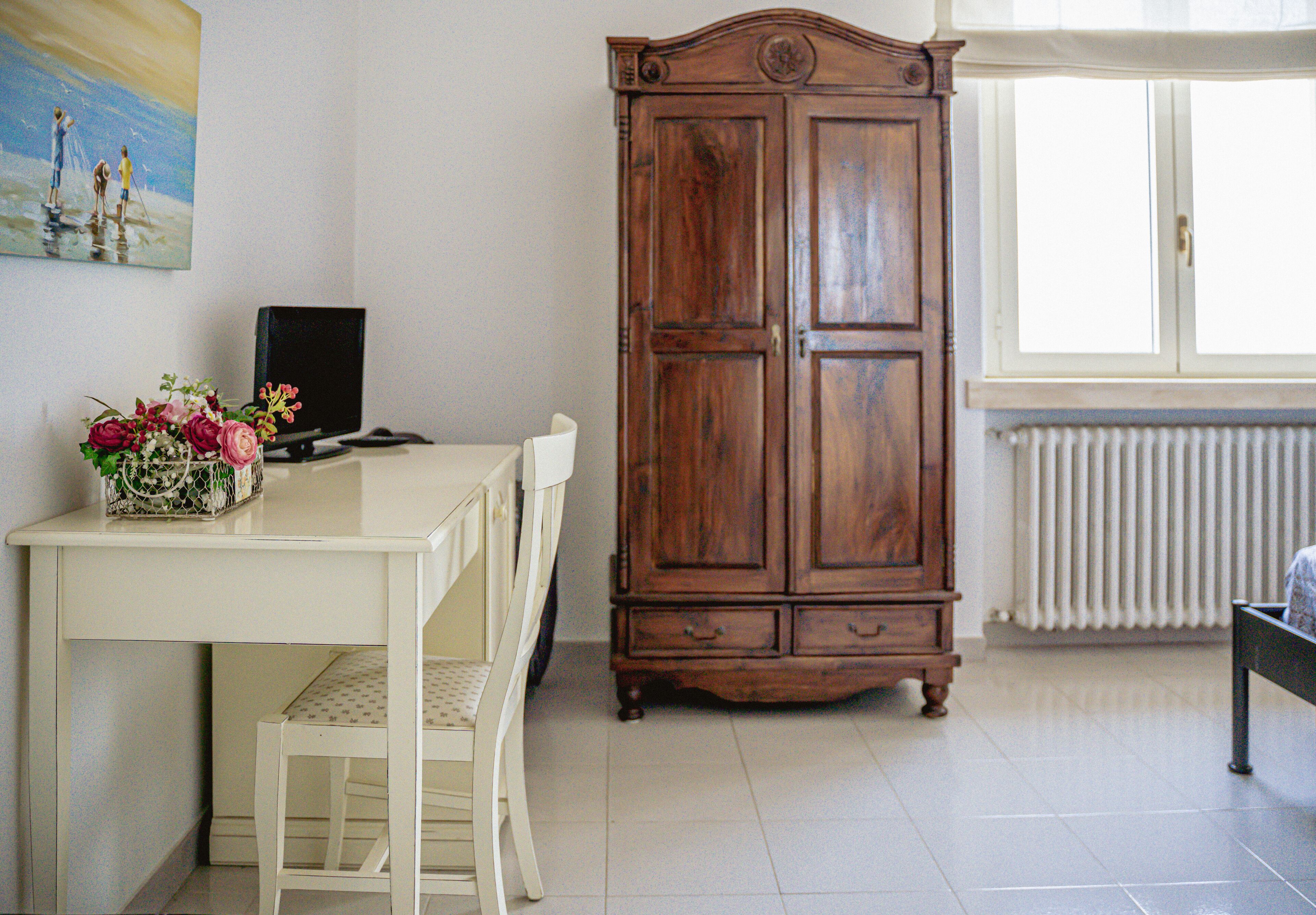 Attico panoramico | Minibar, una scrivania, postazione laptop, tende oscuranti