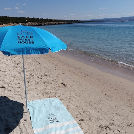 Beach shuttle, beach umbrellas, beach towels