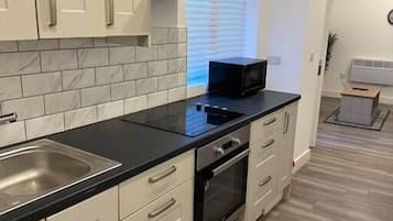 Refrigerador, microondas, horno, placa de cocina