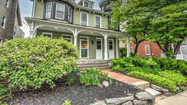 A Victorian-style house with a wrap-around porch, a turret, and a brick chimney. - Cozy Dark & Moody Home, New Reno, 10 mins to Lanc! (Mountville)