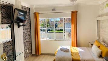 In-room safe, desk, laptop workspace, blackout drapes