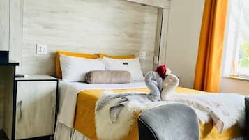 In-room safe, desk, laptop workspace, blackout curtains