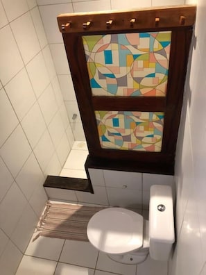 Shower, towels, soap, toilet paper