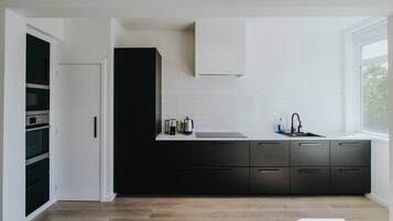 Appartement, Meerdere bedden | Privékeuken | Een koelkast, een microgolfoven, een oven, een kookplaat