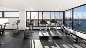 A modern gym with treadmills, stationary bikes, and elliptical machines. - Quest Geelong Central (Geelong)