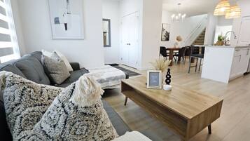 Smart TV, fireplace, books, offices