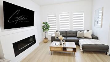 Smart TV, fireplace, books, offices