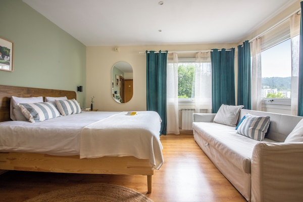 Classic Quadruple Room, Garden View | Desk, soundproofing, free WiFi, bed sheets