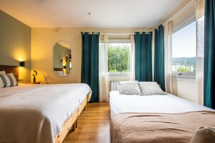 Classic Quadruple Room, Garden View | Desk, soundproofing, free WiFi, bed sheets