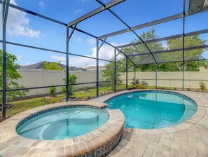 Relax by the pool, surrounded by unobstructed views of the surrounding landscape.