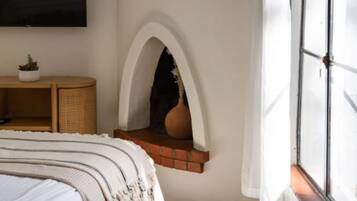 1 bedroom, desk, iron/ironing board, travel crib