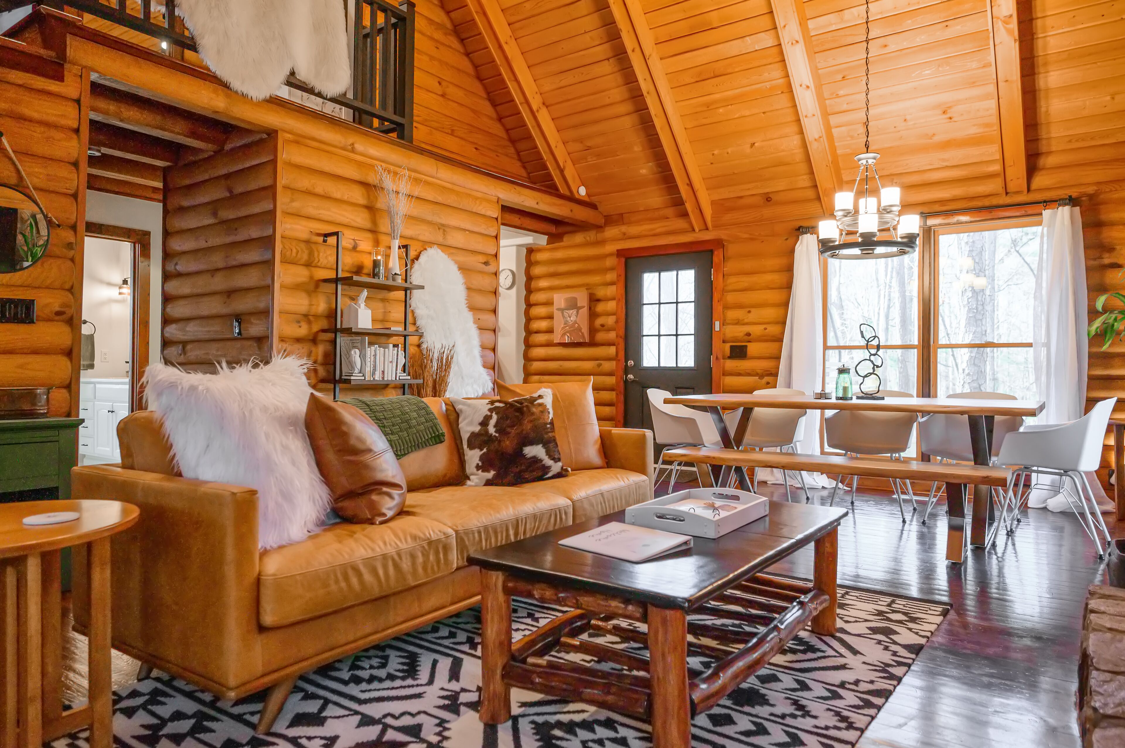 Smart TV, fireplace, books, computer monitors