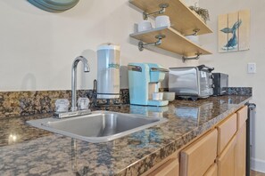 Fridge, microwave, coffee/tea maker, toaster